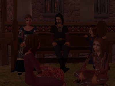 The King sat in his cloistered court with his family gathered round.